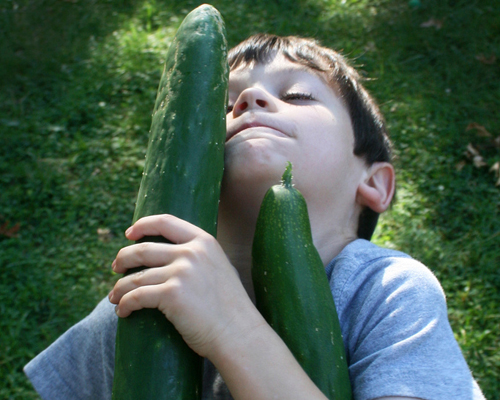 boy with cucumbers, photo woodleywonderworks/Flikr