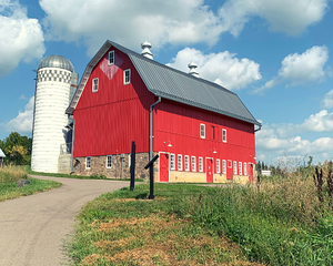 Red barn and white silo
