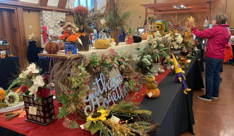 Fall items on a table at the Auxiliary Sale