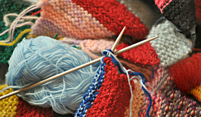 Knitting needles and assorted color yarns