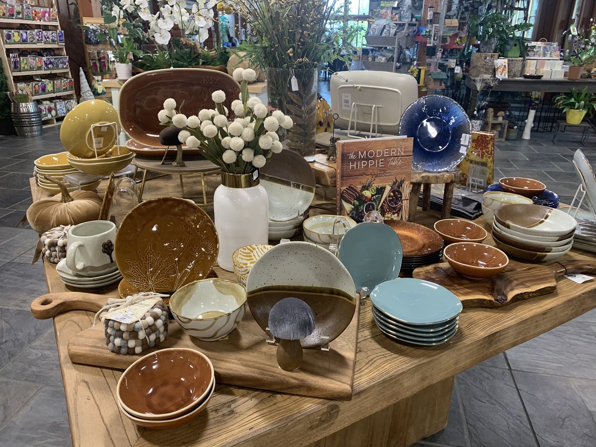 Assorted dishes on display in the gift and garden store