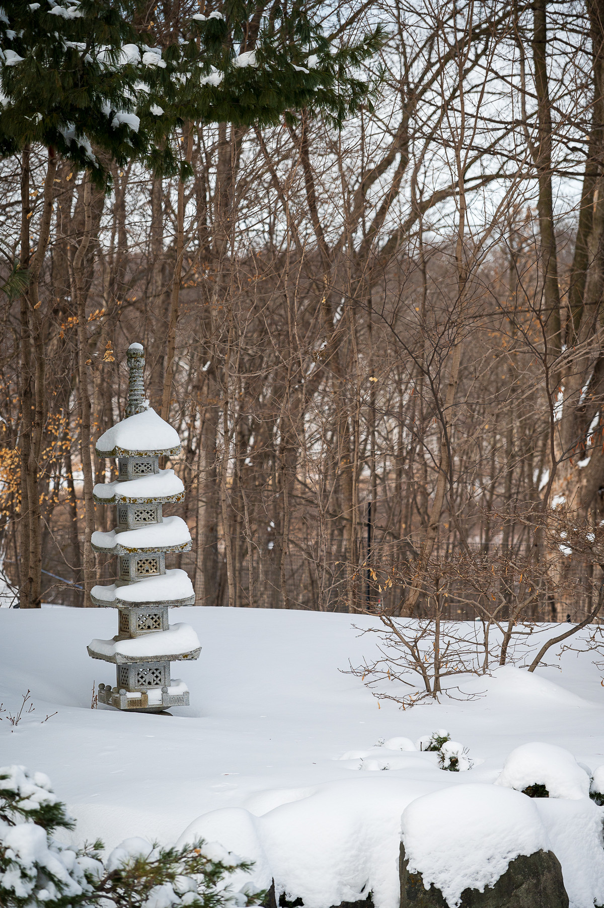 Pagoda stone tower in snow