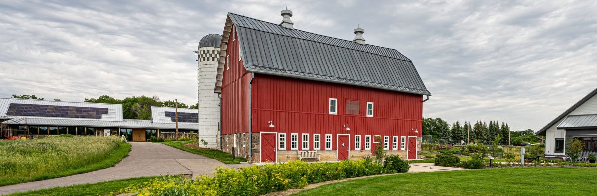 Red barn and green event lawn
