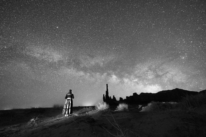 Black and white image of native woman among the stars