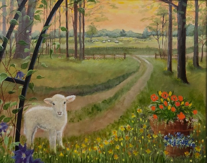Lamb on a road with trees and flowers