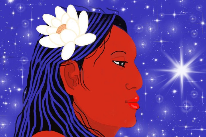 Indigenous woman with a flower looking at stars